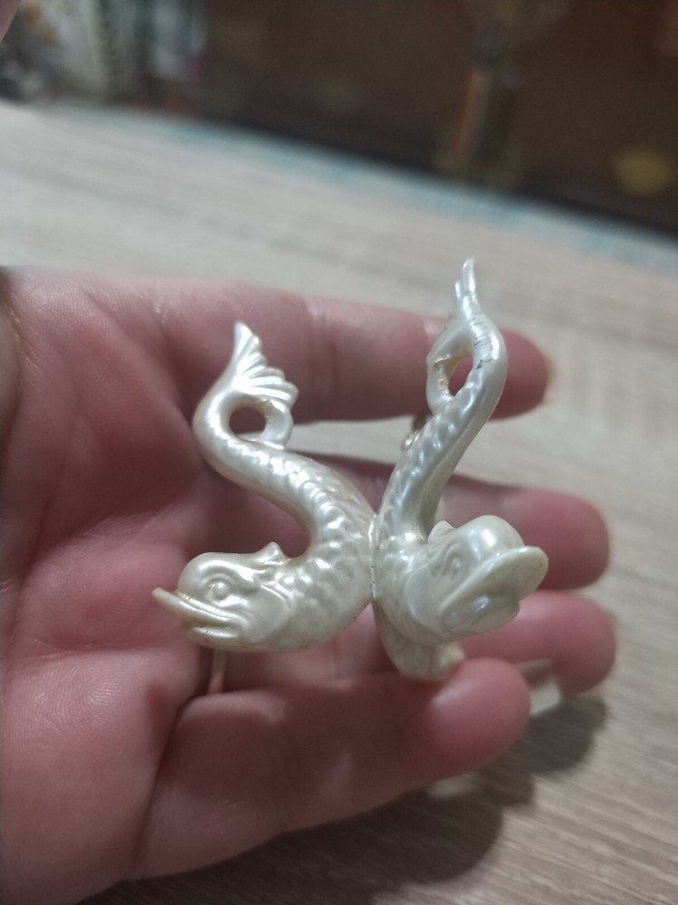 Vintage 1960s white plastic dolphin display stand for egg or sphere