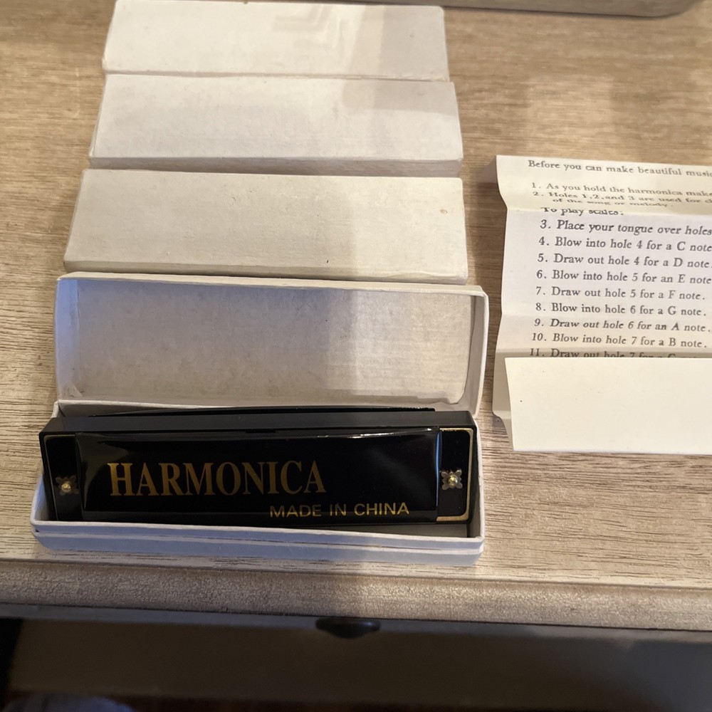 4 HARMONICA MADE IN CHINA (3 new) ( 1 opened used)