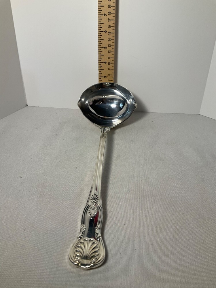 E B Rogers soup ladle silverplate attached rest 10”