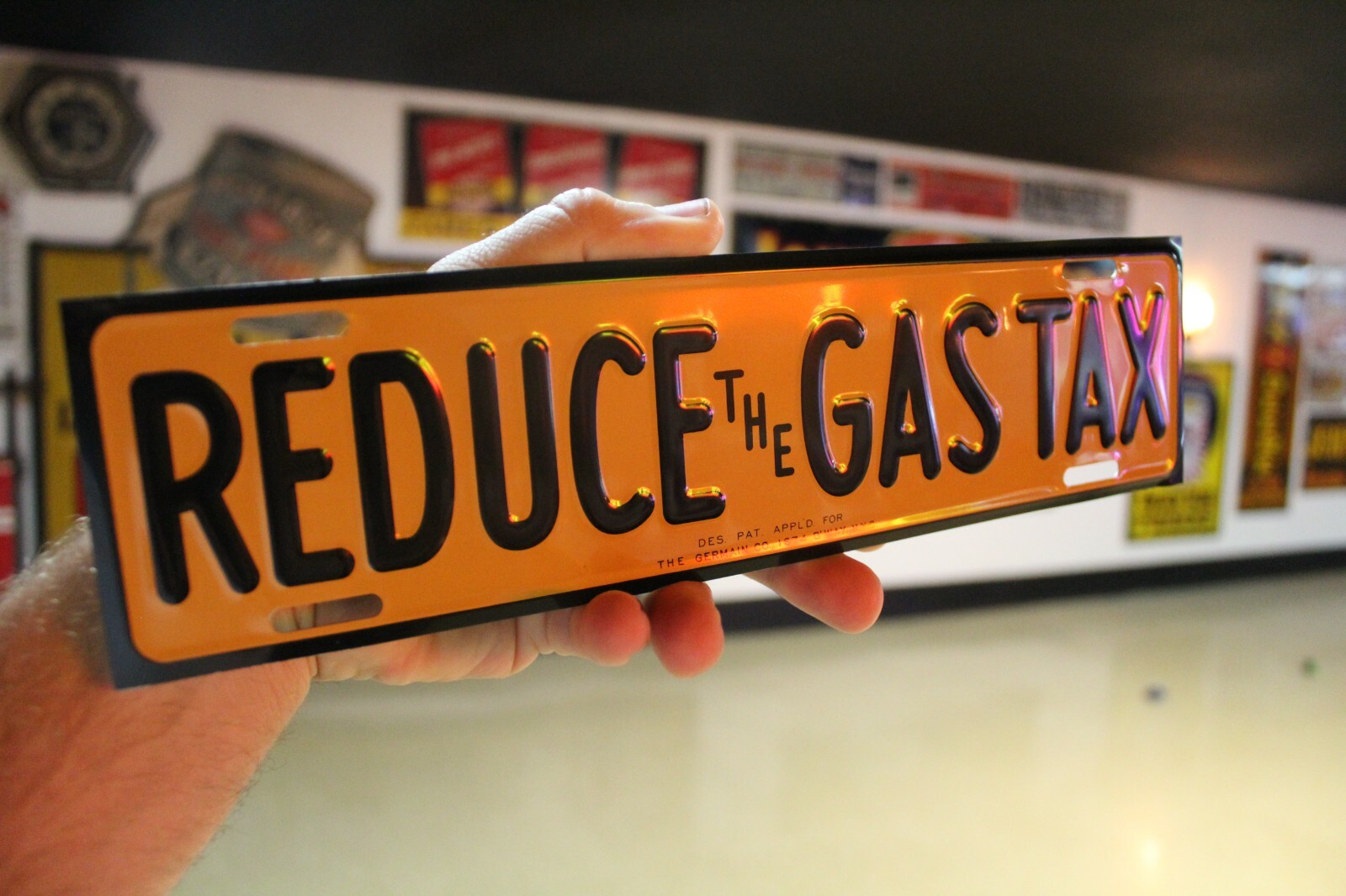RARE REDUCE THE GAS TAX PLATE TOPPER EMBOSSED METAL SIGN SALES GAS OIL FORD