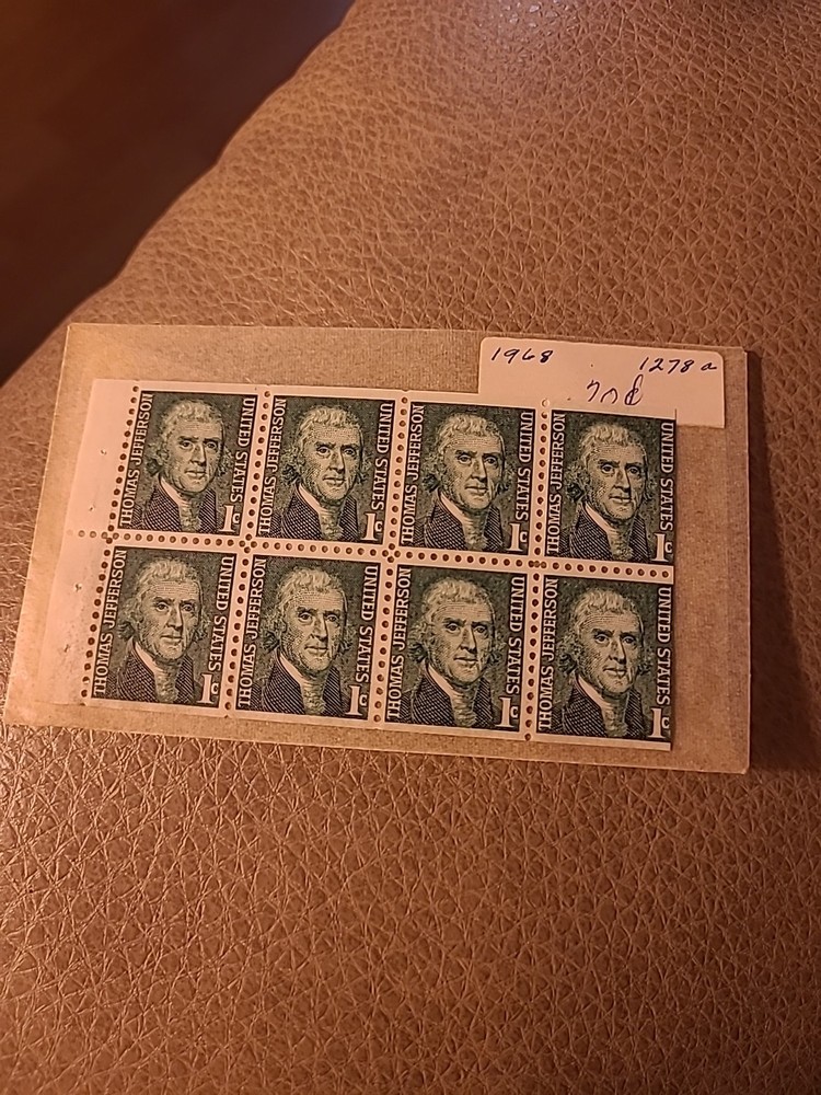 EIGHT 1 CENT STAMPS
