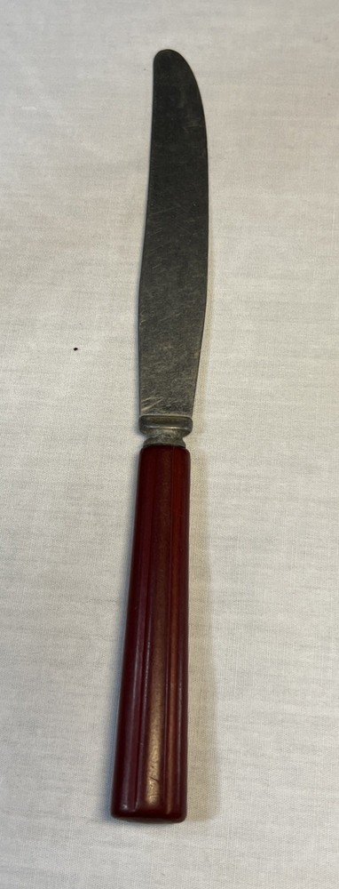 8 3/4” Red Bakelite Dinner Knife