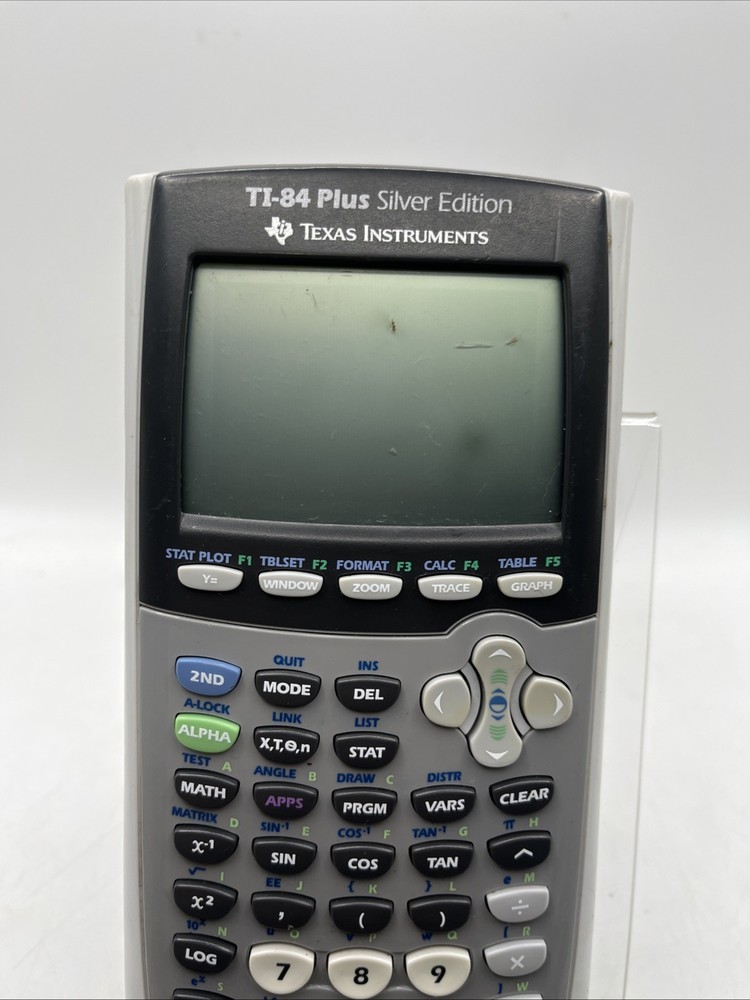 Texas Instruments TI-84 Plus Graphing Calculator - Silver Edition Works