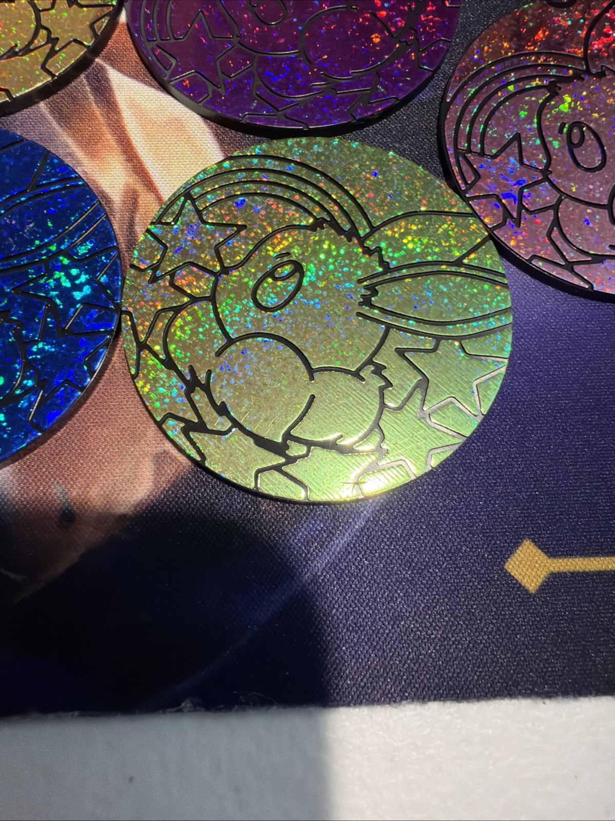 Set Of 7 Pokemon PRISMATIC EVOLUTIONS Jumbo Eevee Coins Sparkle Red Blue Pink