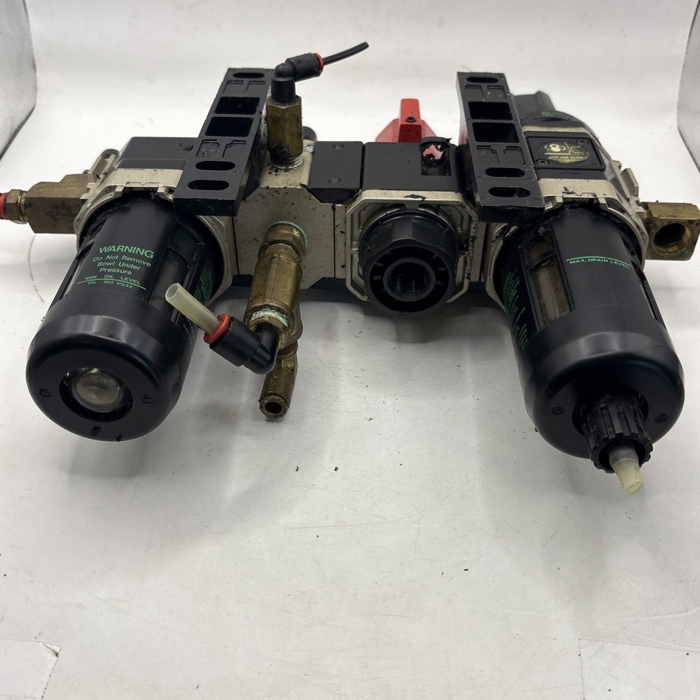 Miller Filter Regulator, Exhaust Valve, Distributor, And Lubricator Assembly