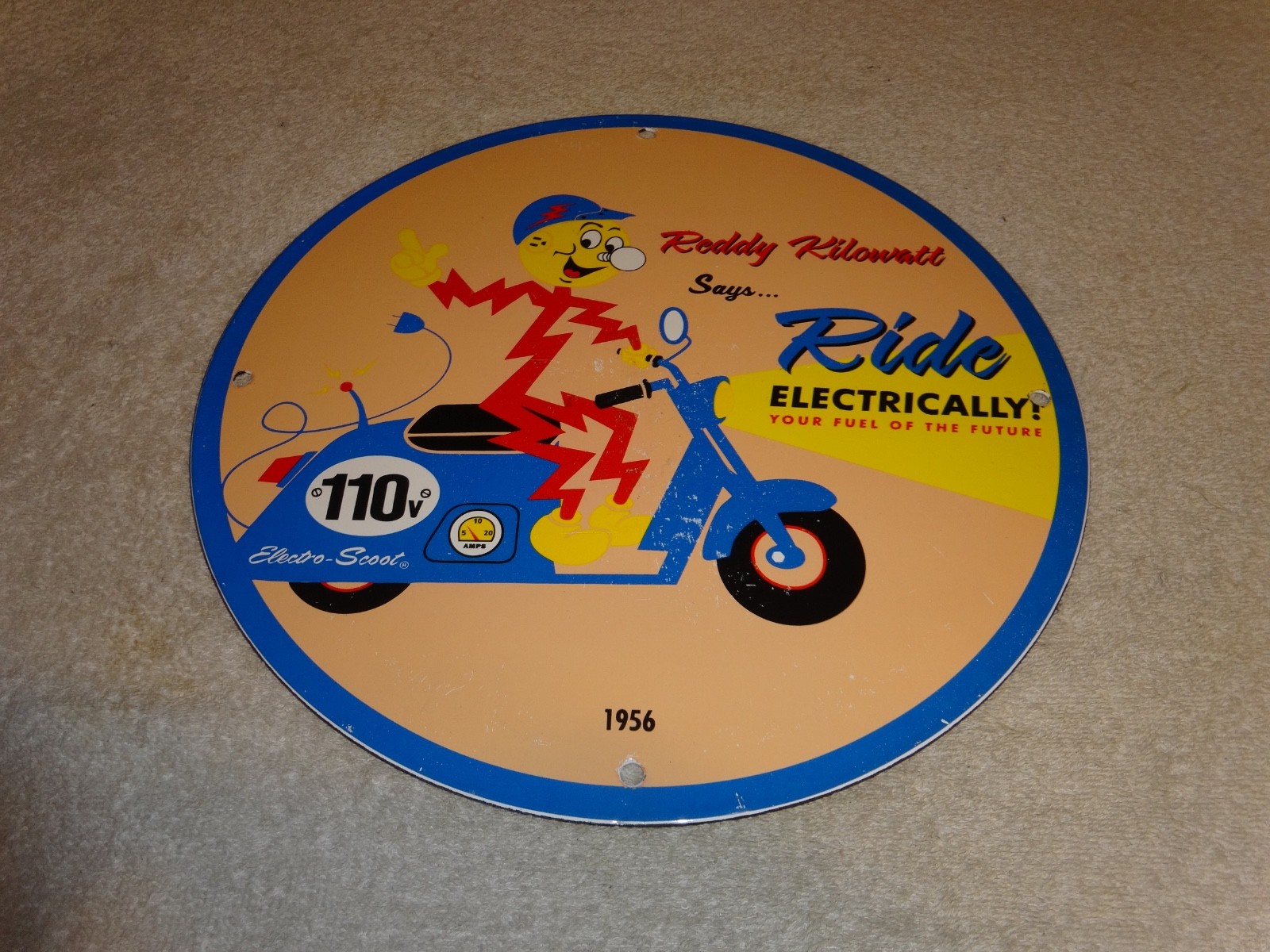 VINTAGE 56 REDDY KILOWATT ELECTRIC SCOOTER 11 3/4" PORCELAIN METAL GASOLINE SIGN