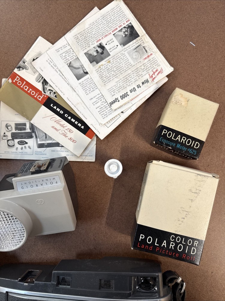 vintage Polaroid Land Camera set includes a camera Model 150 (Case & Accessories