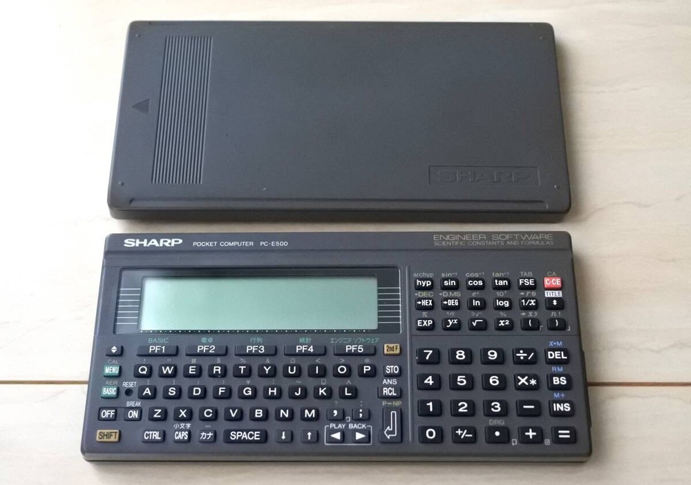 Sharp PC-E500 pocket computer 32KB memory large display BASIC language C338