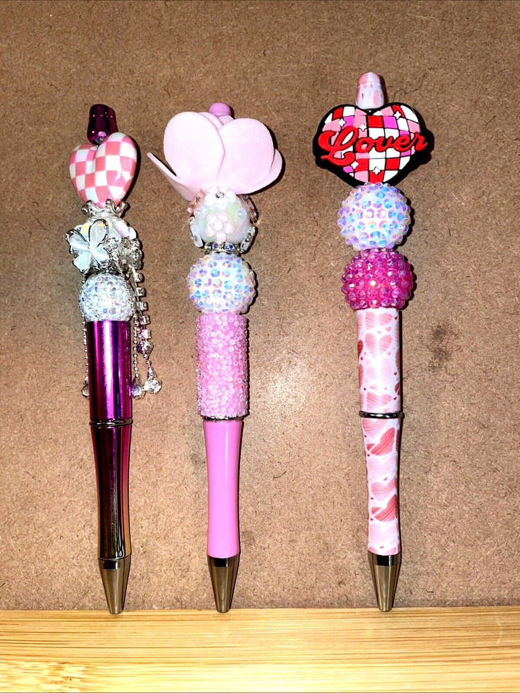 3 miscellaneous beaded pens with 1 ink refill each