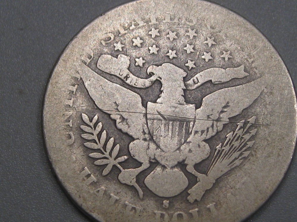 Better-date 1897-s Silver BARBER Half Dollar.