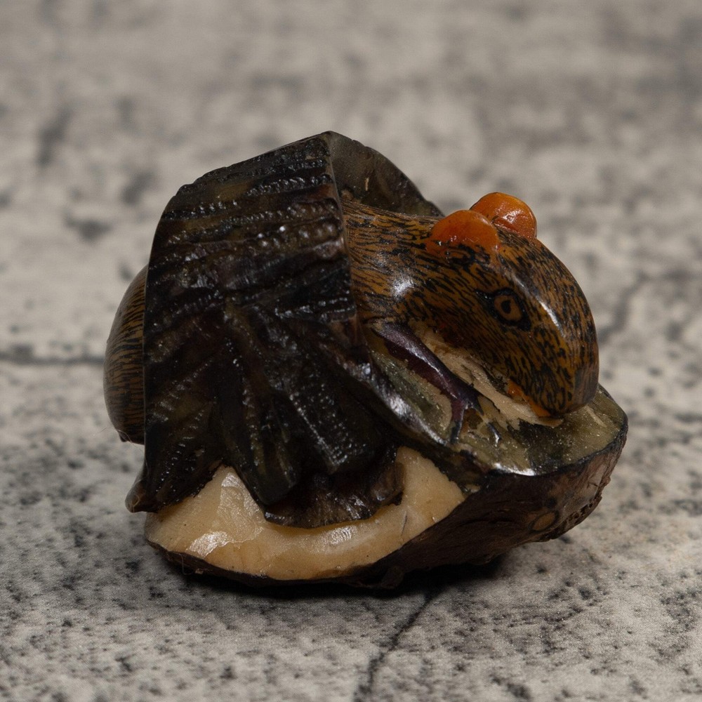 Neque Agouti In Log Tagua Carving
