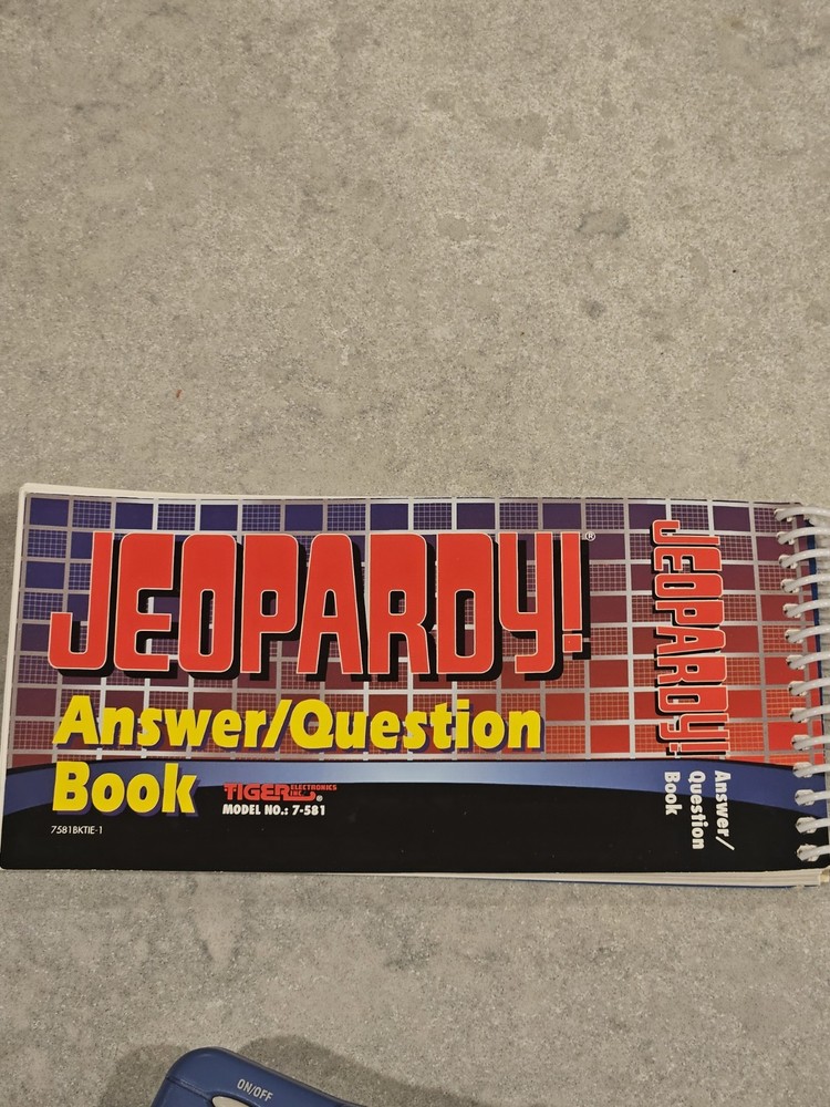 Tiger Electronics Jeopardy Hand Held Game 1995 with Answer Question Book