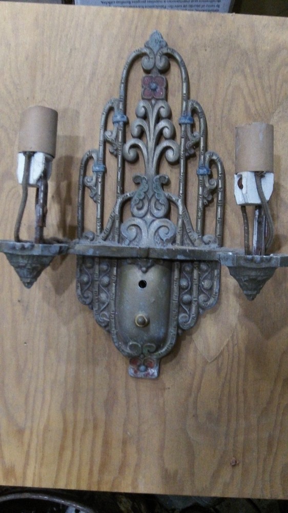 Vintage Lighting Seven sconces by Riddle!