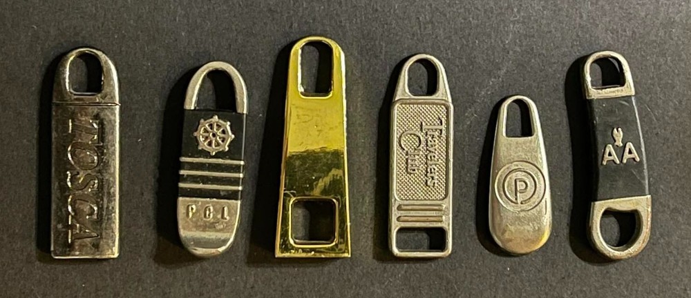 Lot of (6) Assorted Luggage Replacement Zipper Pulls.