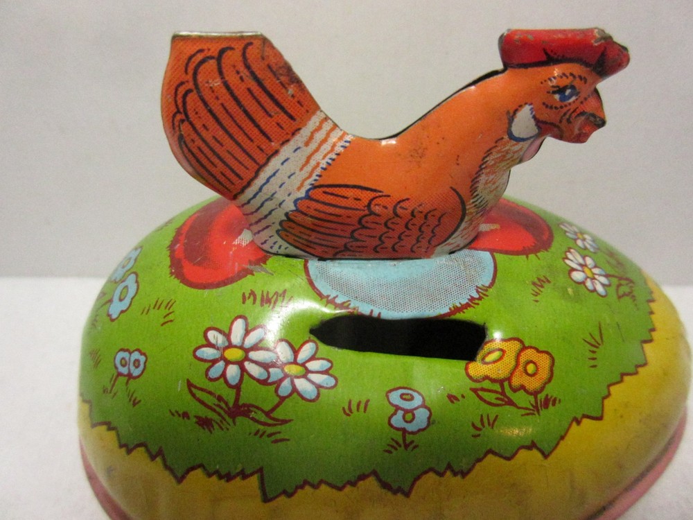 CHEIN TIN NESTING HEN ON EASTER EGG CONTAINER /MADE INTO BANK - DOESN'T OPEN