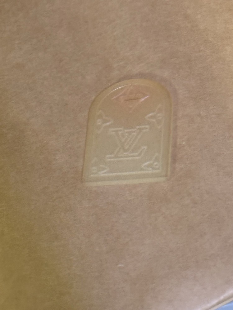 LOUIS VUITTON SILICONE POIGNAT TAG