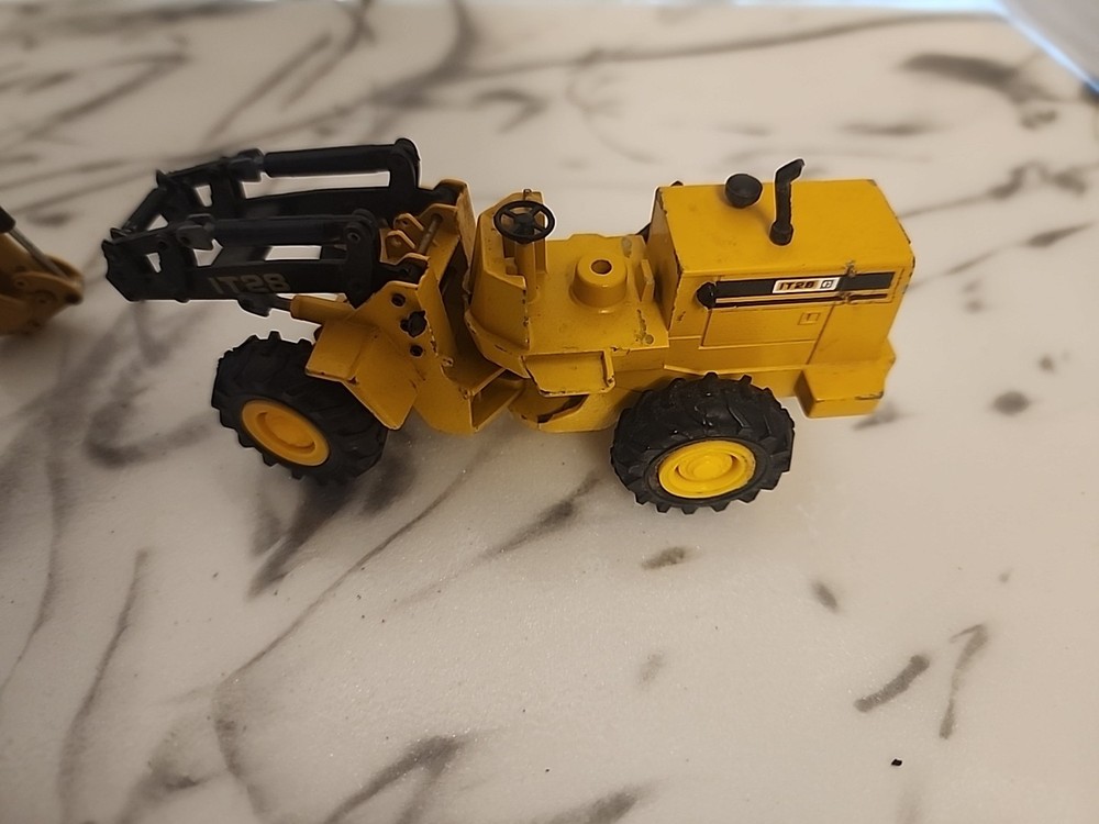Ertl John Deere And Conrad Diecast Models