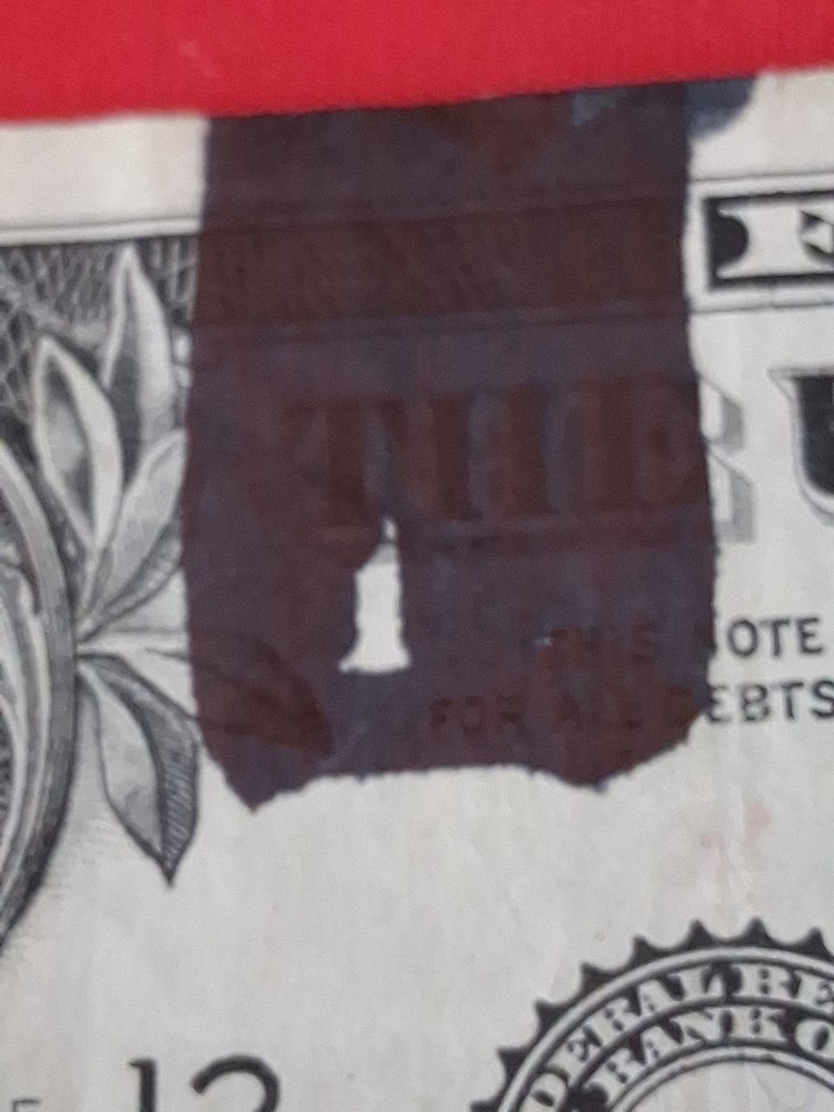 $1 Ink Smear Error with Bleed Through