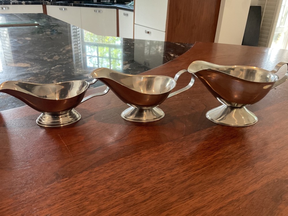 THREE SILVER COLOUR SAUCE BOATS GRADUATED