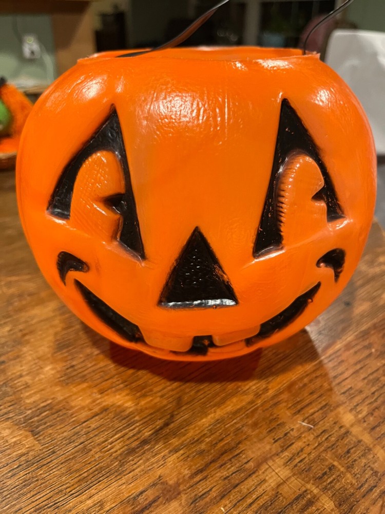 Two jack o lantern pumkins