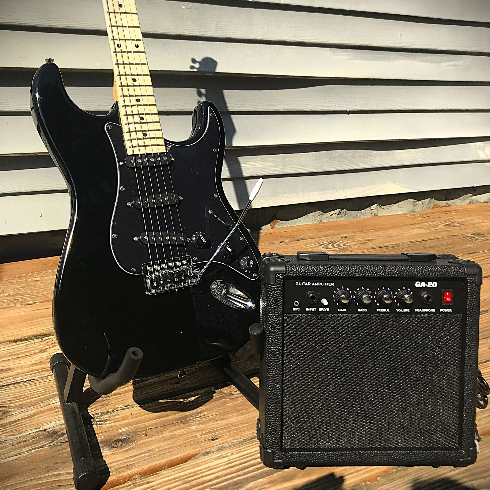 Full-Size Black Electric Guitar Starter Package with 20-Watt Amp and Accessories