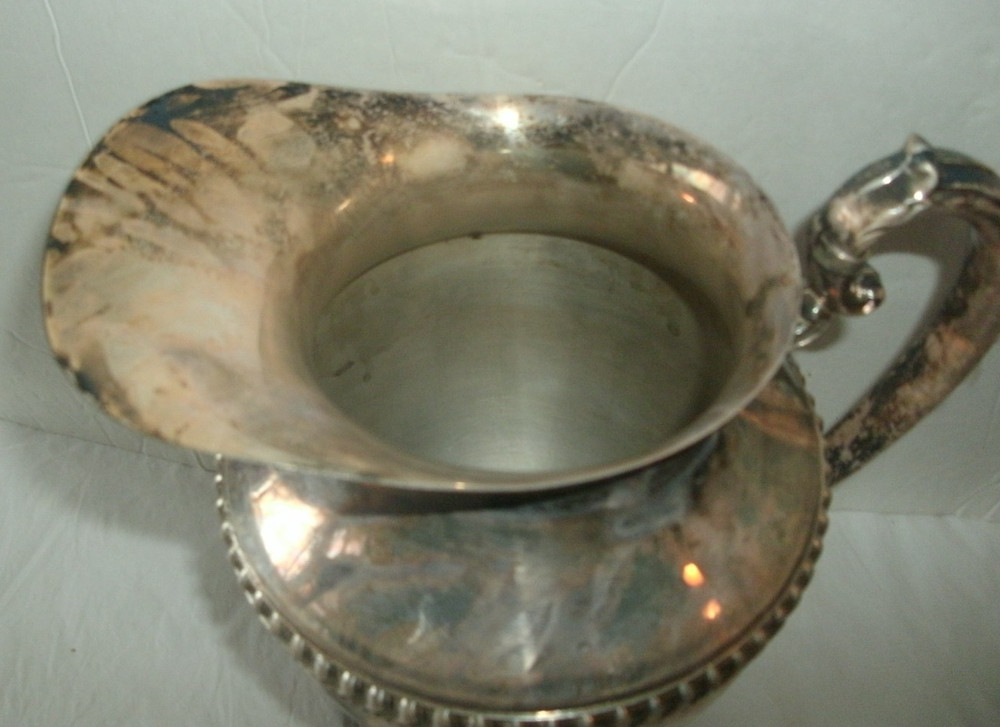 VINTAGE SILVER ON COPPER PITCHER, ENBLEM ON BOTTOM, 9 1/2" TALL