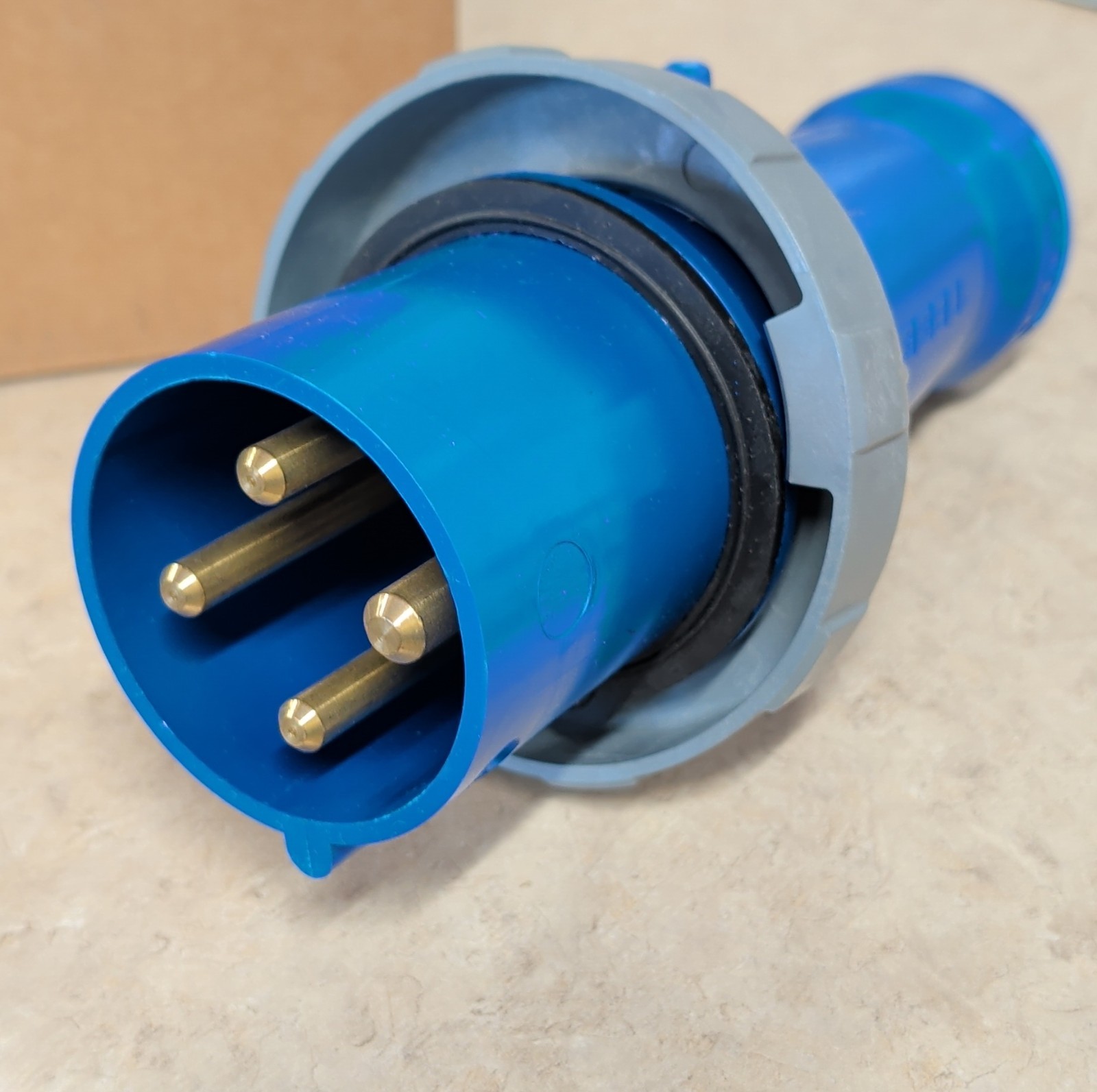 Hubbell HBL460P9W Pin & Sleeve Plug 60A 250V IEC 60309 3P4W IP67 IP69K Blue Gray