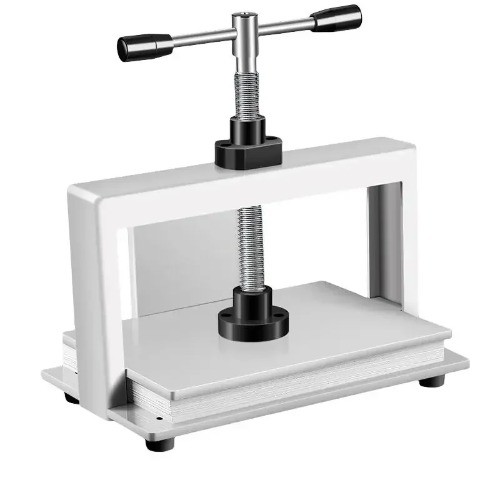 Binding Machine Paper Flattening Machine Small Ticket Book Book Press Machine。