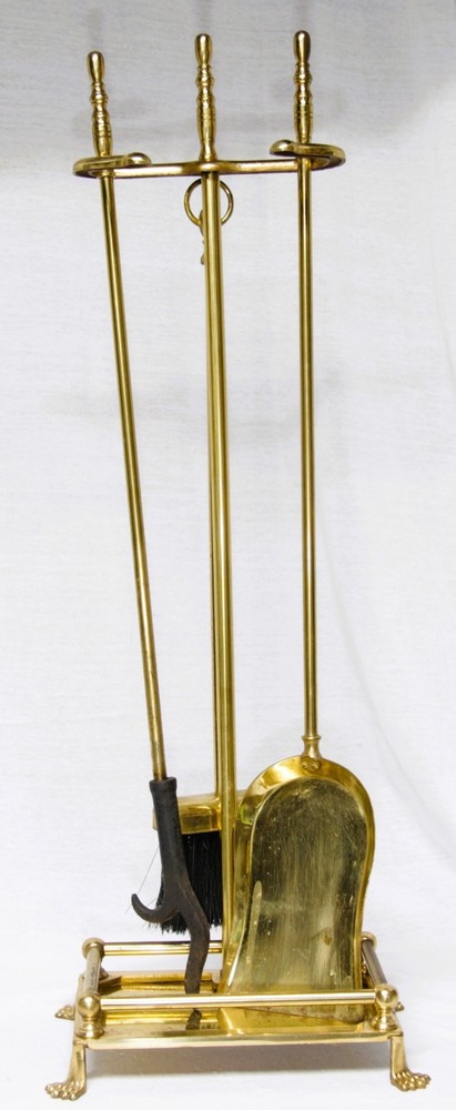 Four-piece brass fireplace poker set