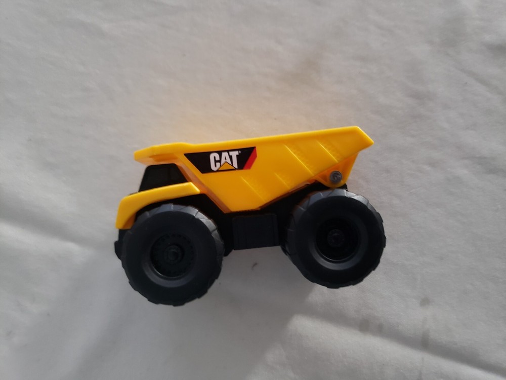 CAT Yellow Dump Truck Construction Vehicle 3.5" Long Plastic euc
