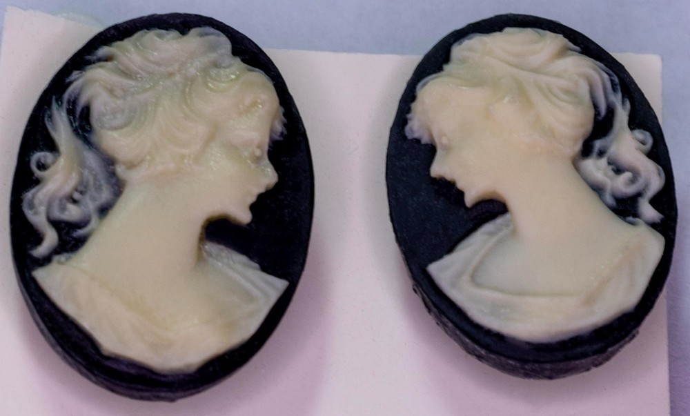 #42  2 Cameo Buttons, ½” x 11/16”