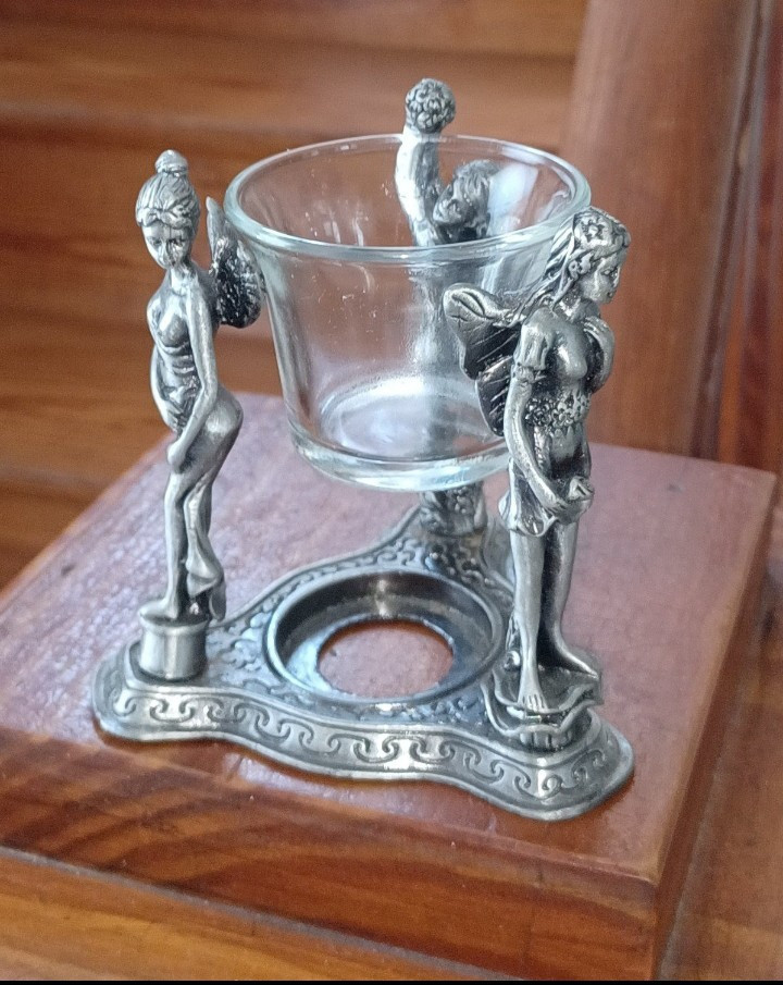 Metal 3 Character Pixie Tealight Holder.