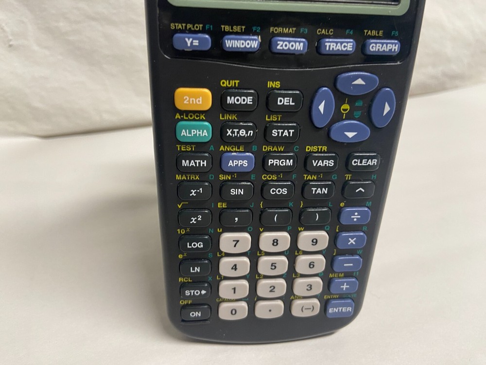 Texas Instruments TI-83 Plus Graphing Calculator Tested Working small dark spot