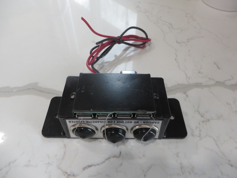 SHO-ME THREE 12V ACCESSORY OUTLETS AND 4 USB PLUG INS