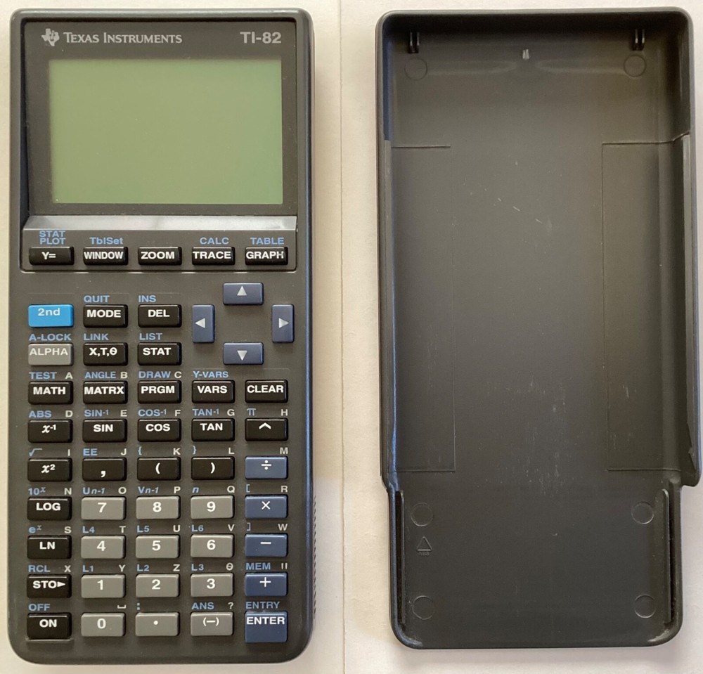 TI-82 Texas Instruments Graphing Calculator with package, case, manual and cable