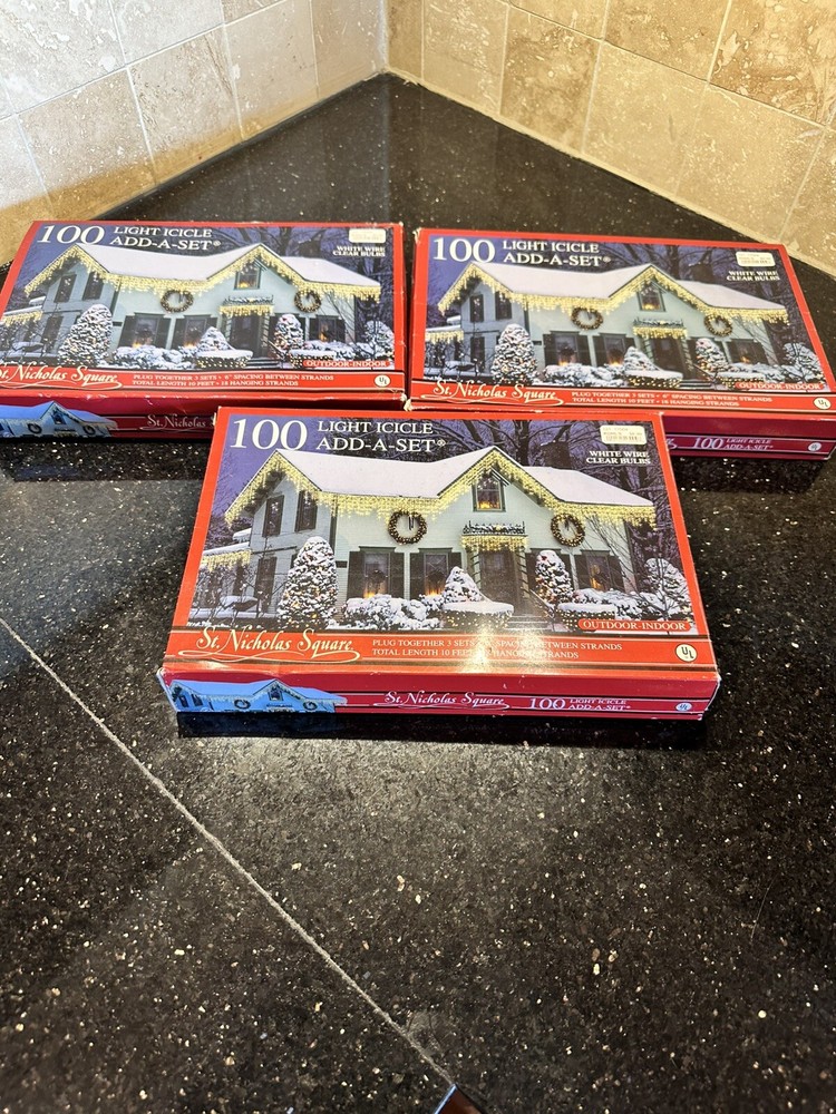 Saint Nicholas Square 100 Light Icicle add a set white wire clear bulbs. 3 Boxes