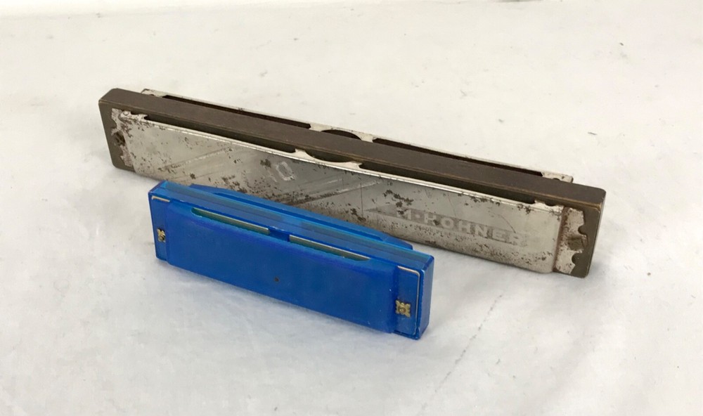 Two Hohner Harmonicas. Hohner Echo (C) & Blue Hohner (C)