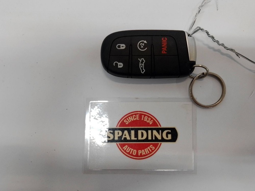 Five Button Fob/Remote from 2014 Chrysler 300 10983703