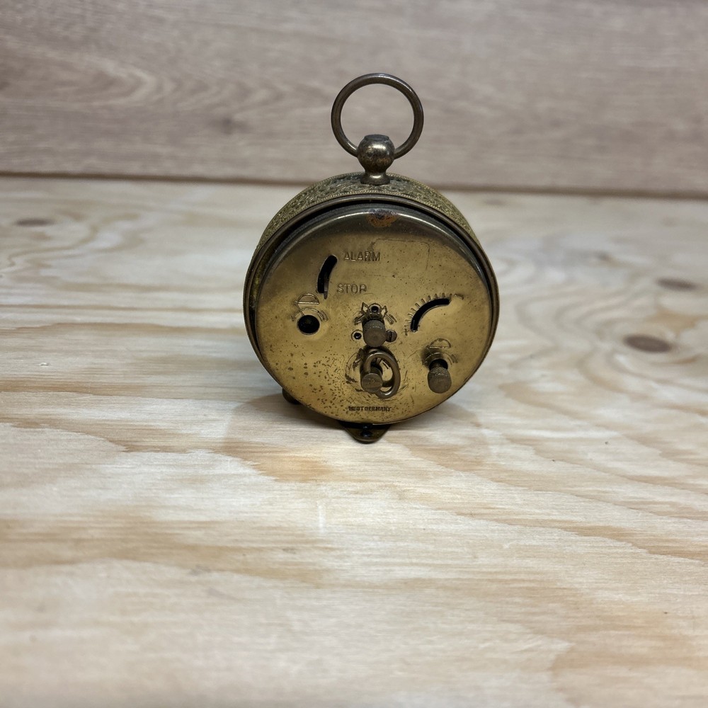 Blessing" German Gilt Metal Alarm Clock. Needs attention and one dial missing