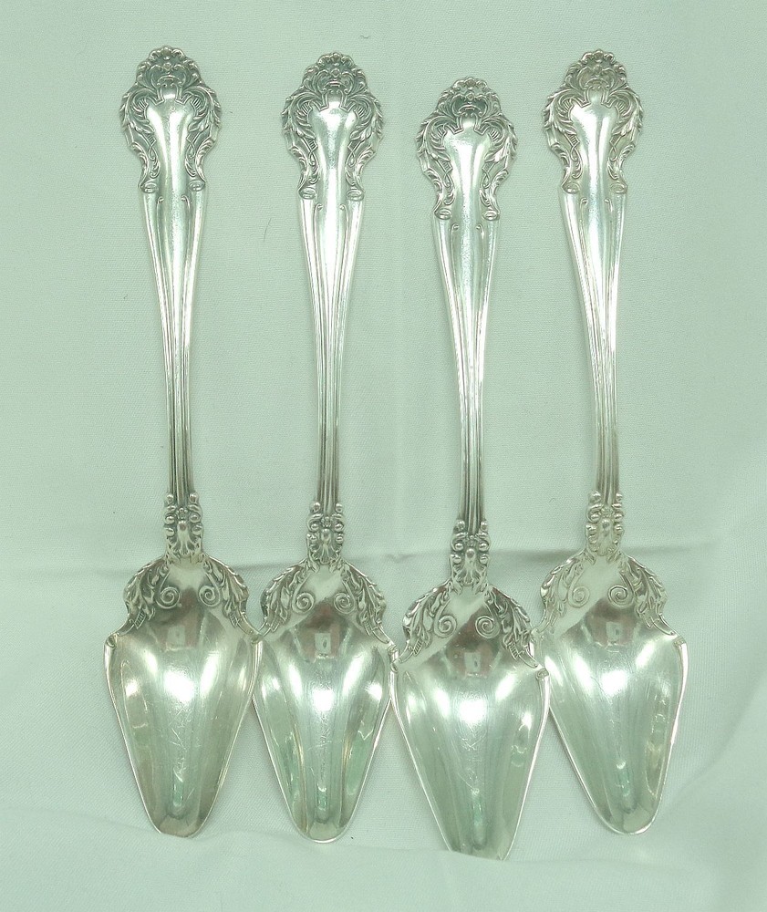 Rogers CEDRIC 1906 4 ornate orange fruit spoons