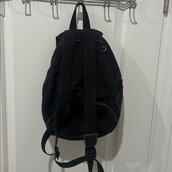 2003 Vintage Kipling Small Black Backpack with Tan Drawstrings