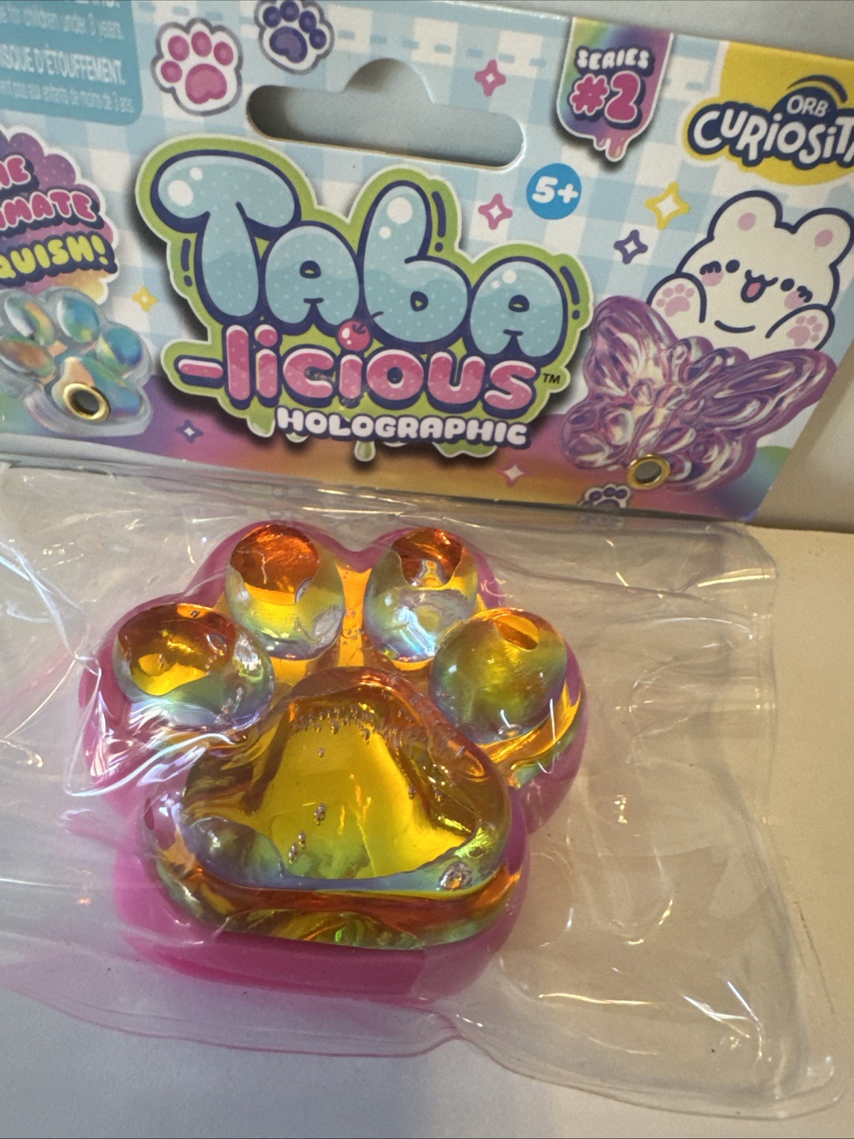 Orb Toys TABA-licious Holographic Paws Paw Print Ultimate Squish Toy Pink Gold