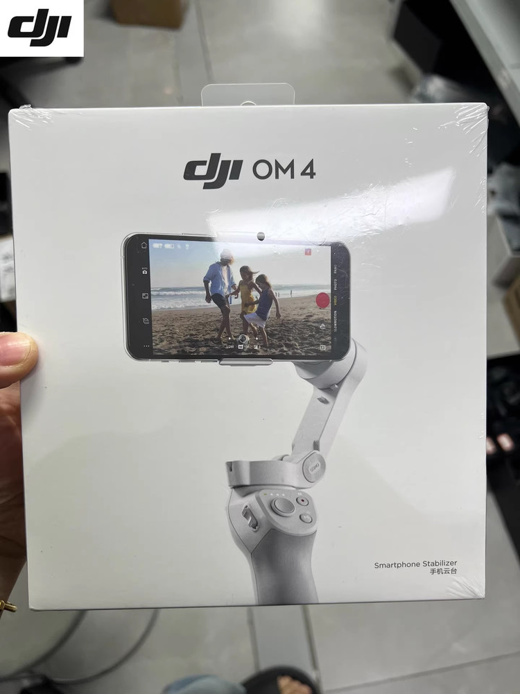 DJI OM 4 - Handheld 3-Axis Smartphone Gimbal Stabilizer with Grip, Tripod