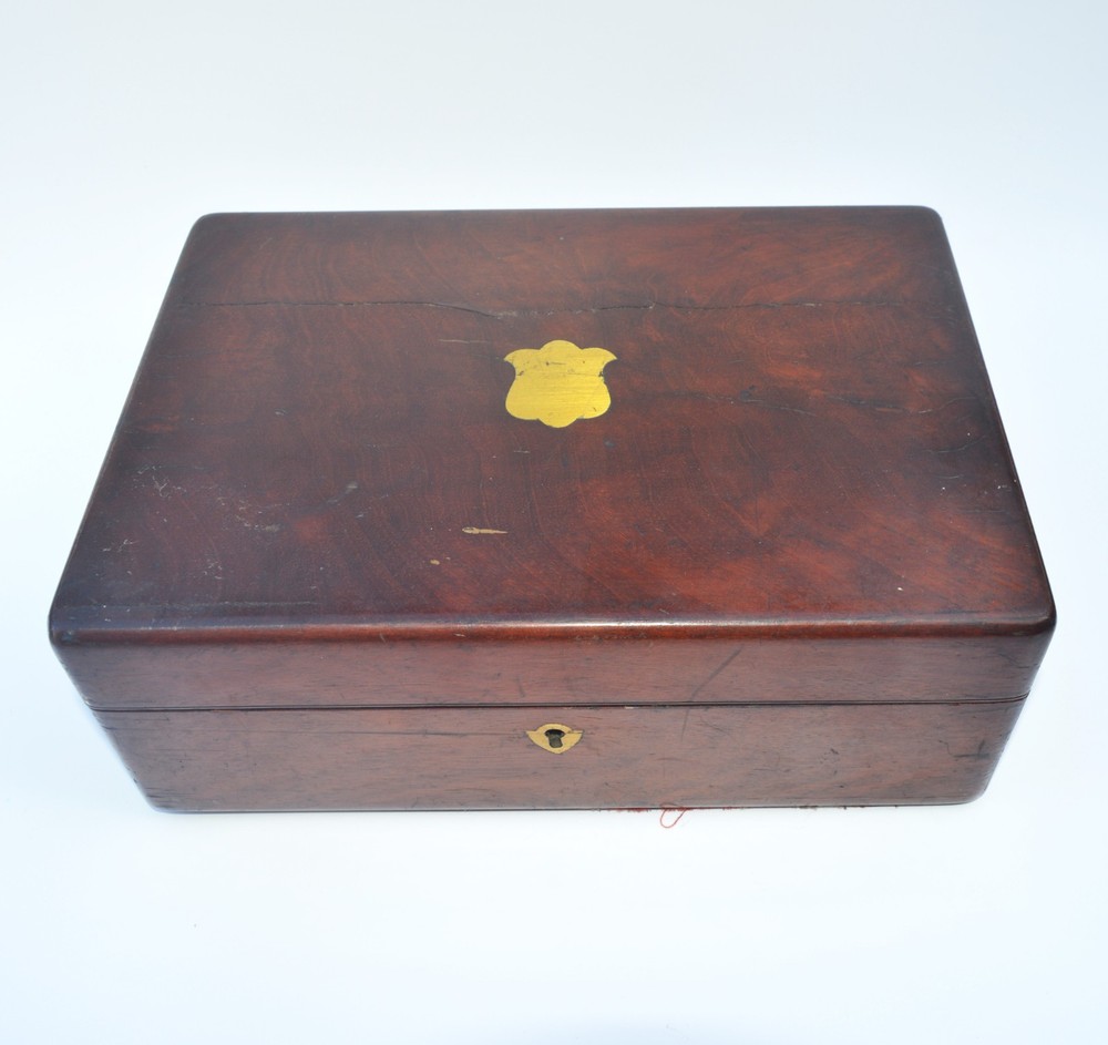 Brass microscope in case.