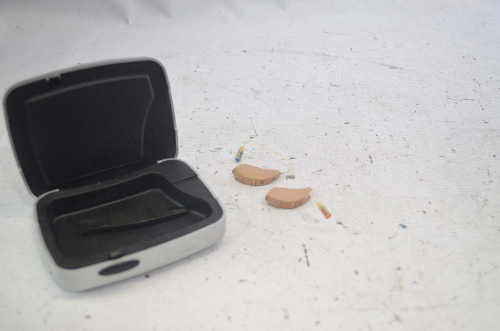Resound Hearing Aids as is not tested missing button , might affect function