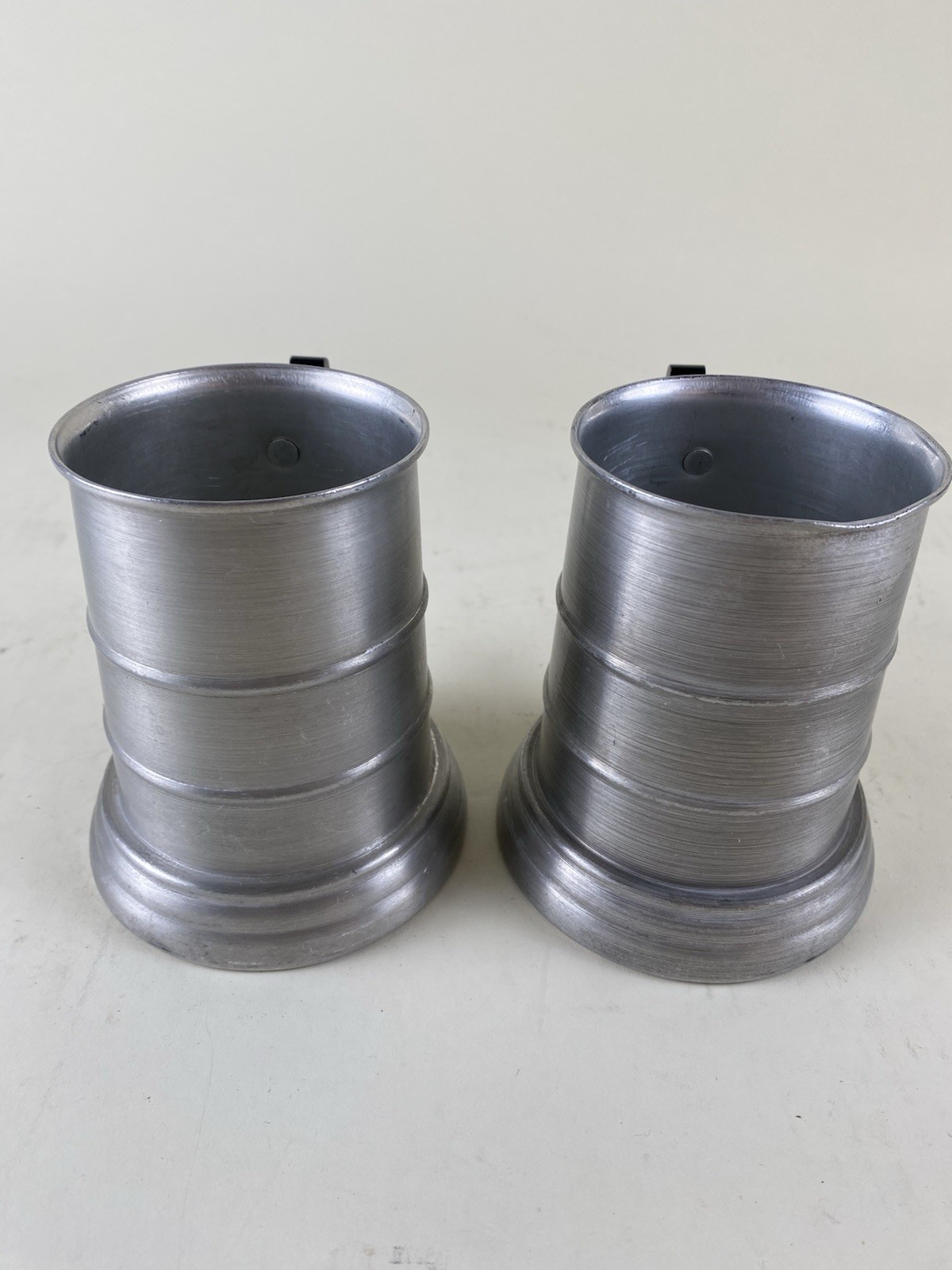 Pair Apex Aluminum Pewter Beer Steins Mugs w Glass Bottom Black Handle Hong Kong