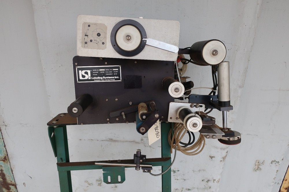 LSI Model 306 Pressure Sensitive Top Labeler Used