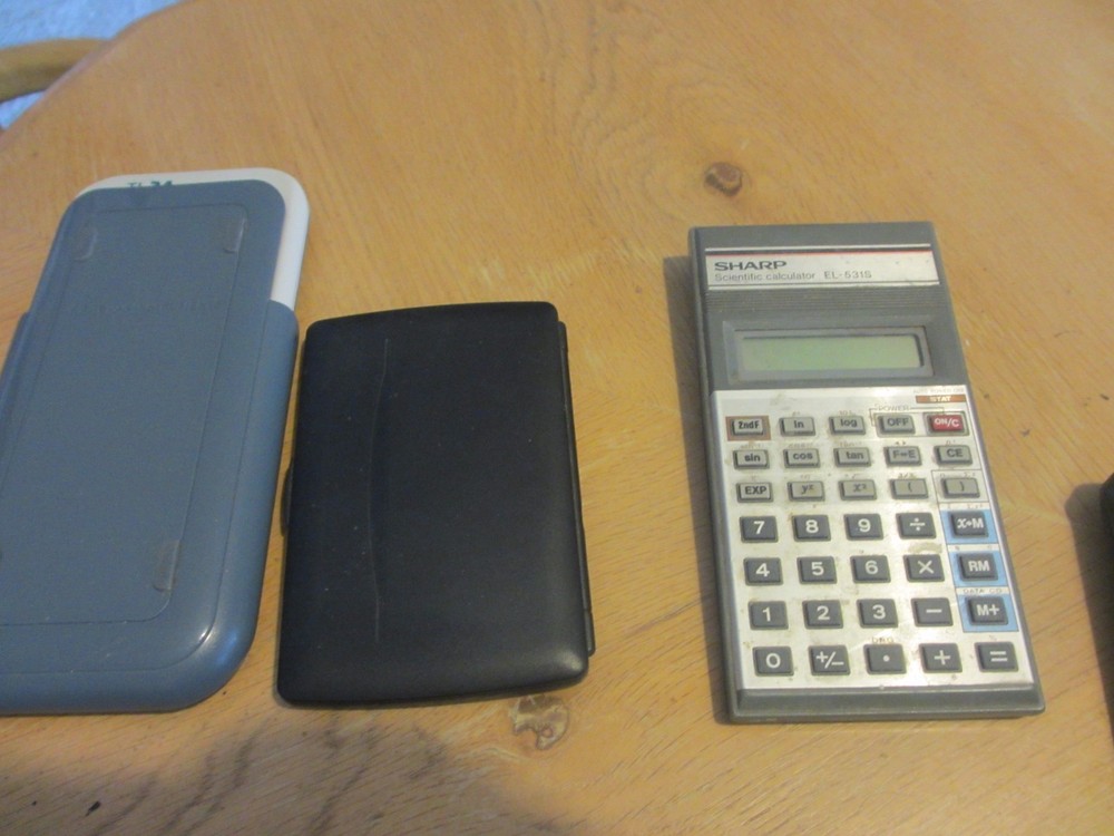 7 Calculators - Scientific - HP - Sharp - Texas Instruments - TI . quantity 7
