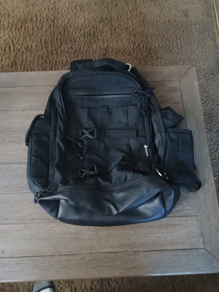 Outdoor Products Leather Bottom Backpack With Multiple Pockets