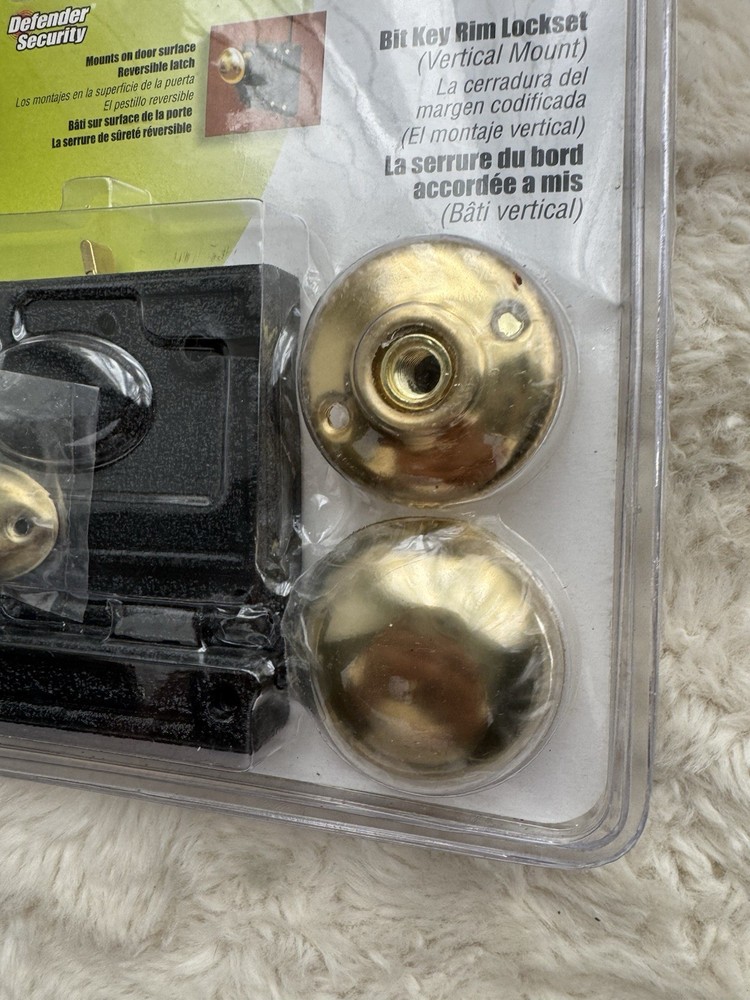 Defender Security Brass/Black Bit Key Rim Lockset, Vertical Style, E-2437